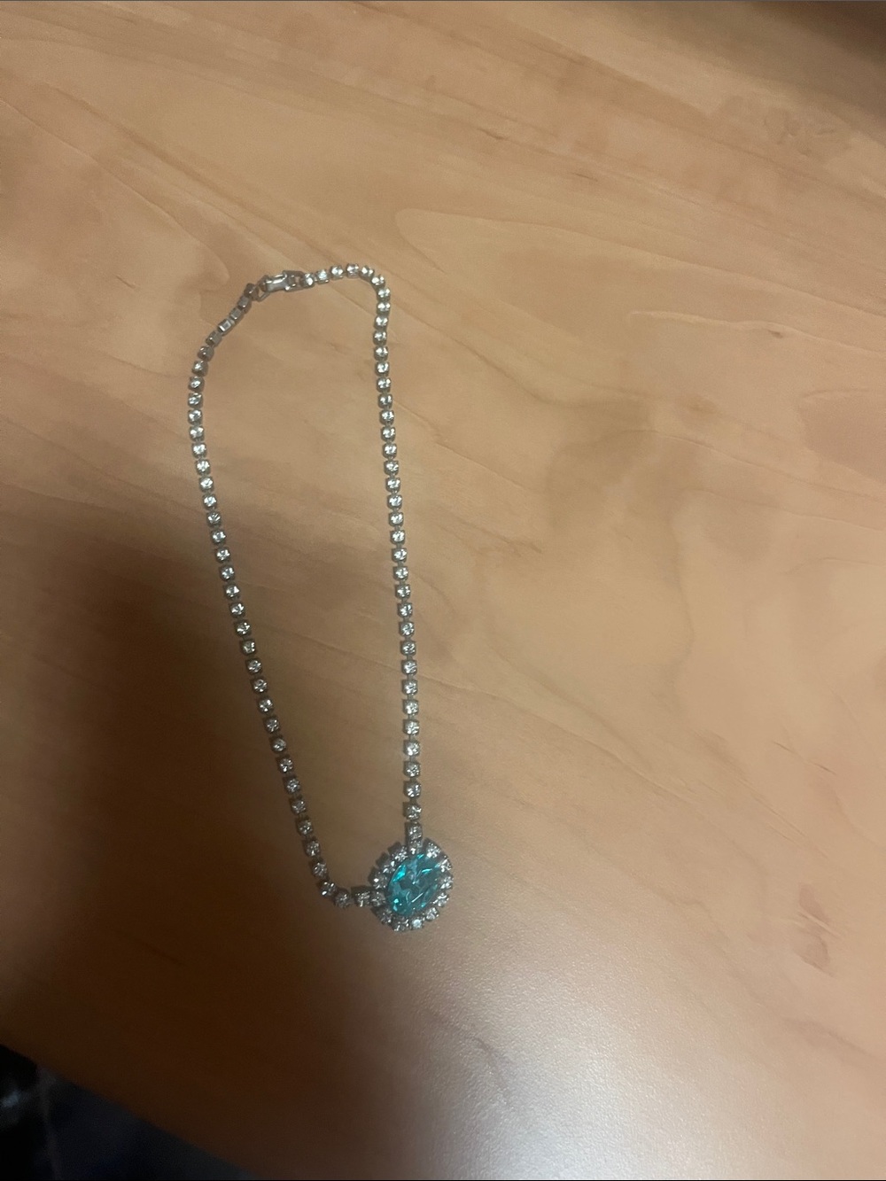 Silver Tennis Necklace with Blue Teardrop Pendant